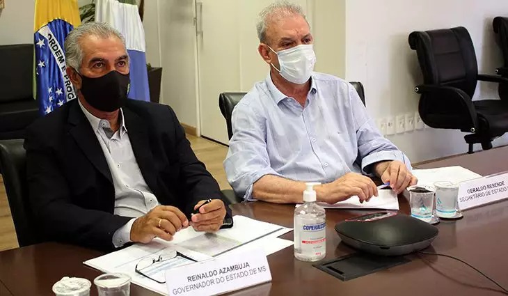 O governador Reinaldo Azambuja e o secretário Geraldo Resende acompanham reunião com ministro da Saúde. (Foto: Divulgação) - CREDITO: CAMPO GRANDE NEWS